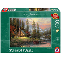 500-teiliges Puzzle mit Motiv eines Hauses in den Bergen.