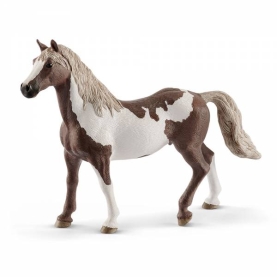 Brauner Schleich Horse Club Paint Horse Wallach aus Kunststoff in natürlicher Farbgebung.