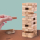 Das Spiel des wackeligen Turms - Tumbling Tower