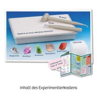 Mineralien-Experimentierkasten mit verschiedenen Kristallen und mineralischen Proben in einem blauen Kasten